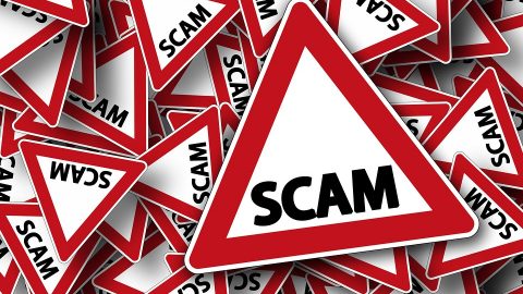scam-road-sign